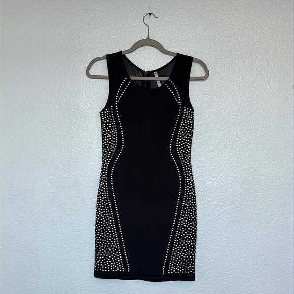 Short stretch dress with metallic stones on a black base, curvy cut, size S - Picture 1 of 10